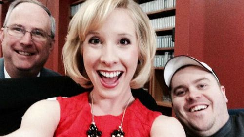 A photo of Alison Parker (centre) and cameraman Adam Ward (right).