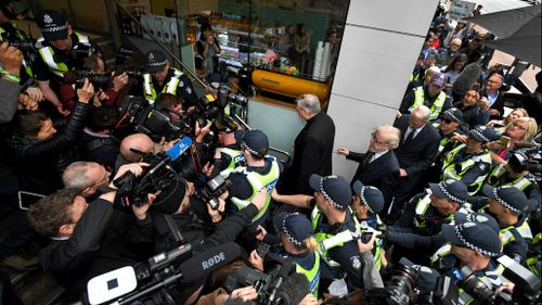 A crushing media scrum followed Cardinal Pell to his lawyers office following the court appearance.