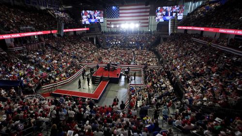 The crowd listens as Republican presidential candidate former President Donald Trump speaks at a campaign rally at Georgia State University in Atlanta, Saturday, Aug. 3, 2024. (AP Photo/John Bazemore)