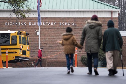 FILE - Students return to Richneck Elementary on Jan. 30, 2023, in Newport News, Va. A grand jury in Virginia has indicted the mother of a 6-year-old boy who shot his teacher on charges of child neglect and failing to secure her handgun in the family's home, a prosecutor said Monday, April 10. (Billy Schuerman/The Virginian-Pilot via AP, File)