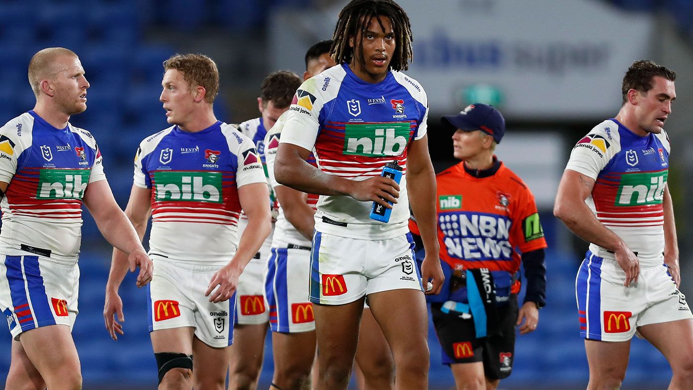 Knights players look dejected after a Storm try during the round 18 NRL match between the Melbourne Storm and the Newcastle Knights at Cbus Super Stadium, on July 17, 2021, in Gold Coast, Australia. (Photo by Regi Varghese/Getty Images)