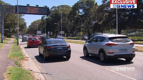 Motorist caught on two phones at the wheel among 1000 danger drivers caught every day by new cameras