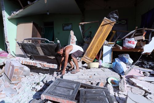 Claims have risen of tourists and locals looting abandoned stores after food and water supplies rapidly decreased. Picture: AAP.