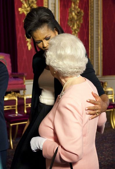 Michelle Obama broke royal protocol by embracing the Queen.