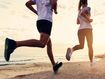 Two people running near beach.