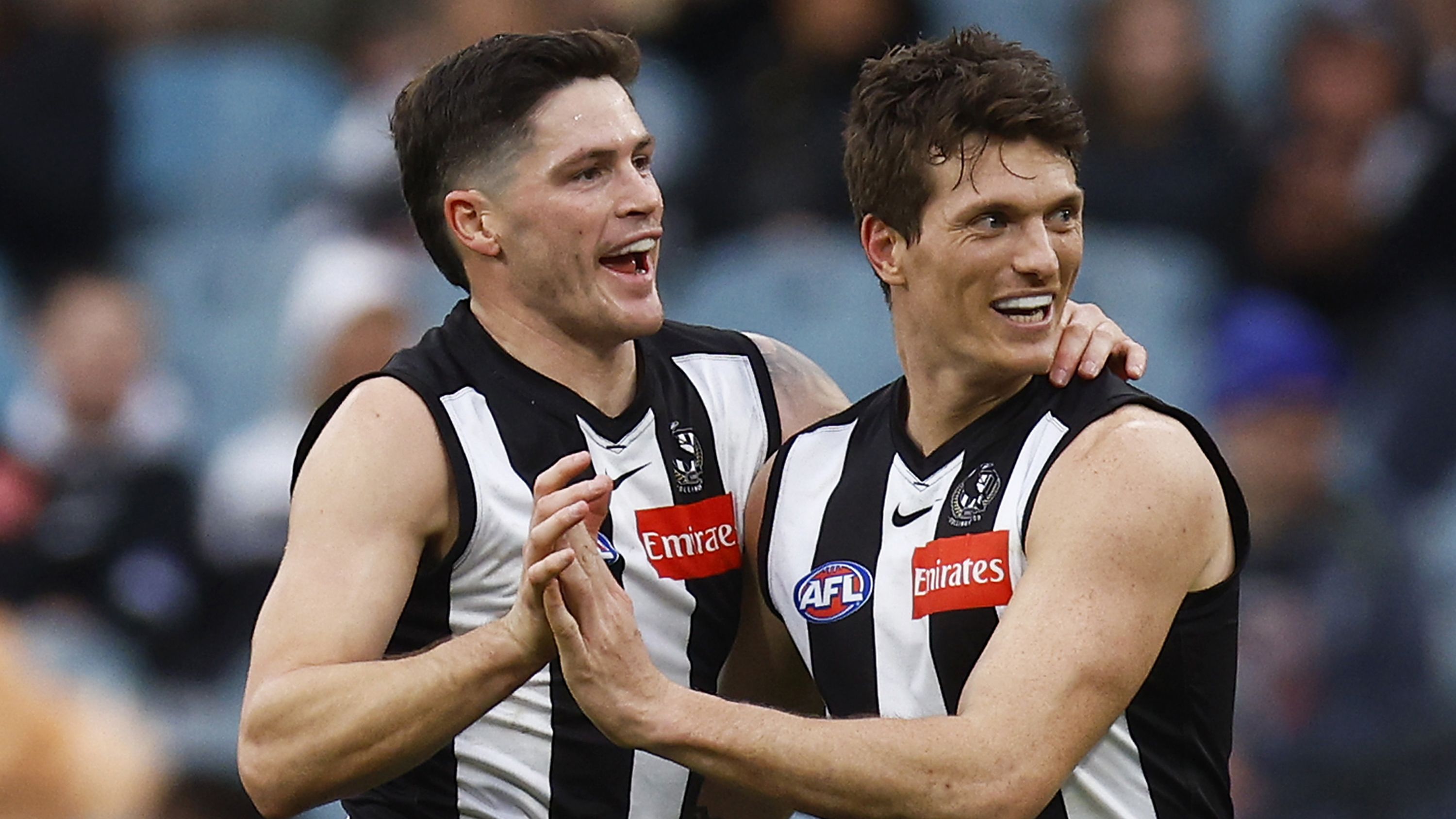 Brody Mihocek (R) celebrates with Jack Crisp after kicking a goal.