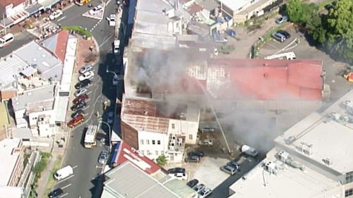 Firefighters attend the scene in Lidcombe, NSW. (9NEWS)