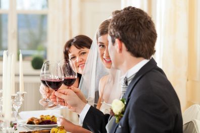 Guests at bride and groom table at wedding