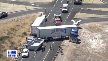 A﻿ road train has jackknifed and caused a pool to smash into a car&#x27;s windscreen on a highway south of Perth.