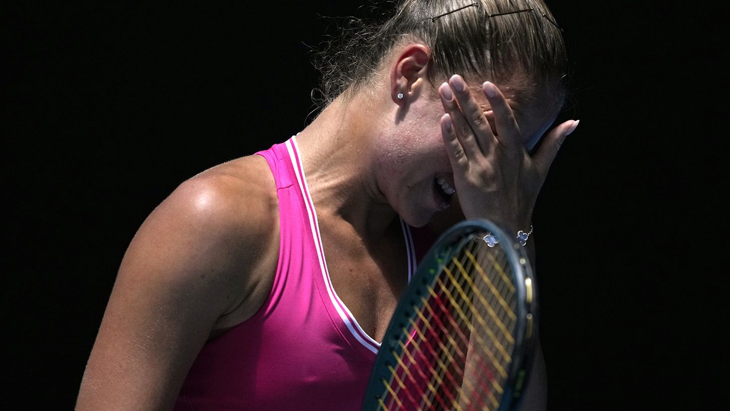 Marta Kostyuk of Ukraine reacts during her quarterfinal match against Coco Gauff of the US at the Australian Open.