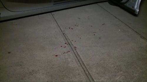 A blood spatter was left on the pavement outside the police station. Picture: 9NEWS