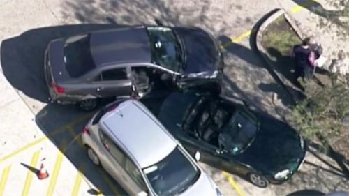 Elderly man fatally stuck by own car at Sydney service centre