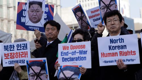 South Korean protesters and North Korean defectors in Seoul.