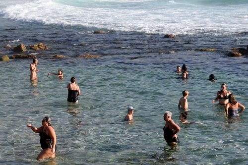 Swimmers cool off at Bronte Beach in Sydney's south today.
