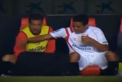 <b>Spanish defender Fernando Navarro has joined the list of athletes captured answering call of nature call during a recent clash between Sevilla and Elche.</b><br/><br/>The Sevilla bench warmer was awaiting his turn to hit the action when he was filmed entering the team dug-out and grabbing a cup, before a teammate generously handed him his jacket to cover his modesty while he did the business.<br/><br/>While Navarro's act was broadcast to millions of fans, at least he covered up - unlike a host of NRL, rugby and football stars, who showed less modesty.<br/><br/><br/><br/><br/> <br/>