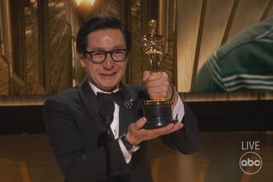 Ke Huy Quan with his Best Supporting Actor Oscar at the 2023 awards.