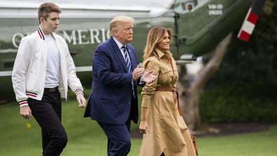 President Donald Trump, first lady Melania Trump and their son, Barron Trump, arrive at the White House from a weekend trip to New Jersey, Sunday, Aug. 16, 2020, in Washington. 
