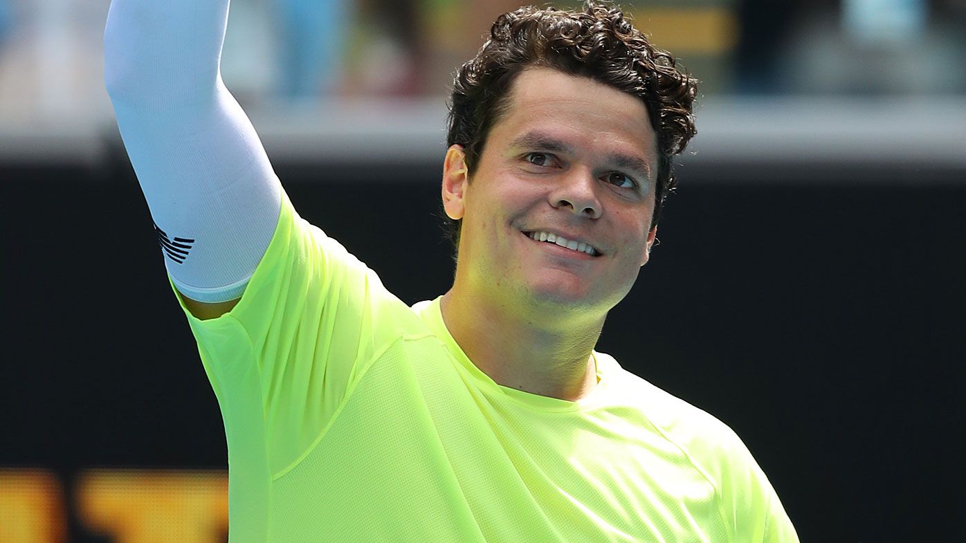 Milos Raonic of Canada celebrates after winning match point 