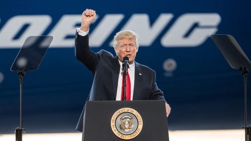 US President Donald Trump addresses a crowd during the debut event for the Dreamliner 787-10 at Boeing's South Carolina facilities on February 17, 2017 in North Charleston, South Carolina. (AFP)