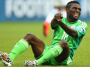 Nigeria's Michael Babatunde reacts after breaking his arm. (Getty)