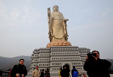 How tall is the Spring Temple Buddha, the world's second tallest statue?