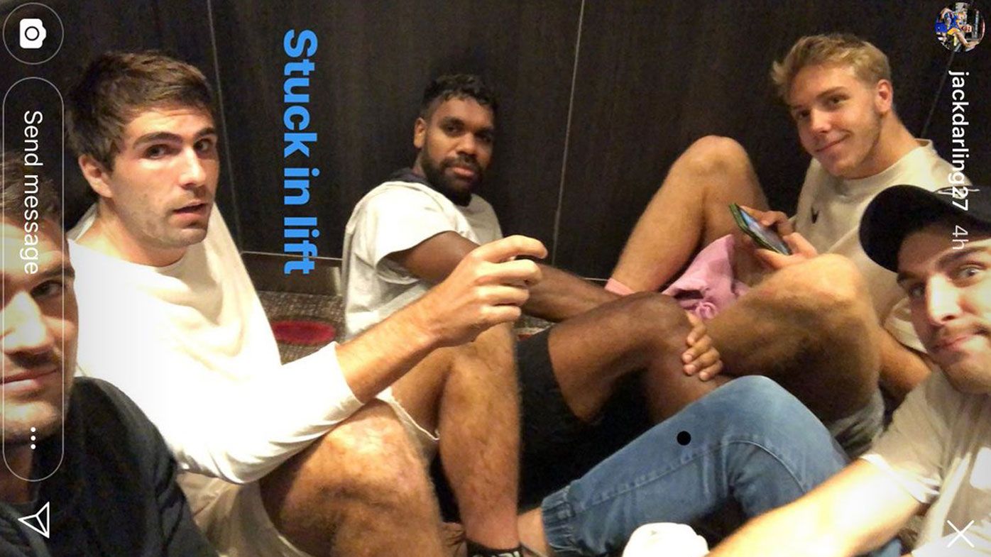 West Coast Eagles players stuck in the lift