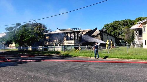 Authorities are investigating the fatal house fire after a man's boy was found at the back of the property. 