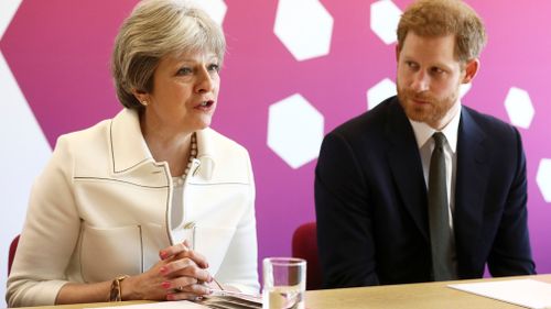 Prince Harry and British PM Theresa May met with delegates from across the Commonwealth. (AP/AAP)