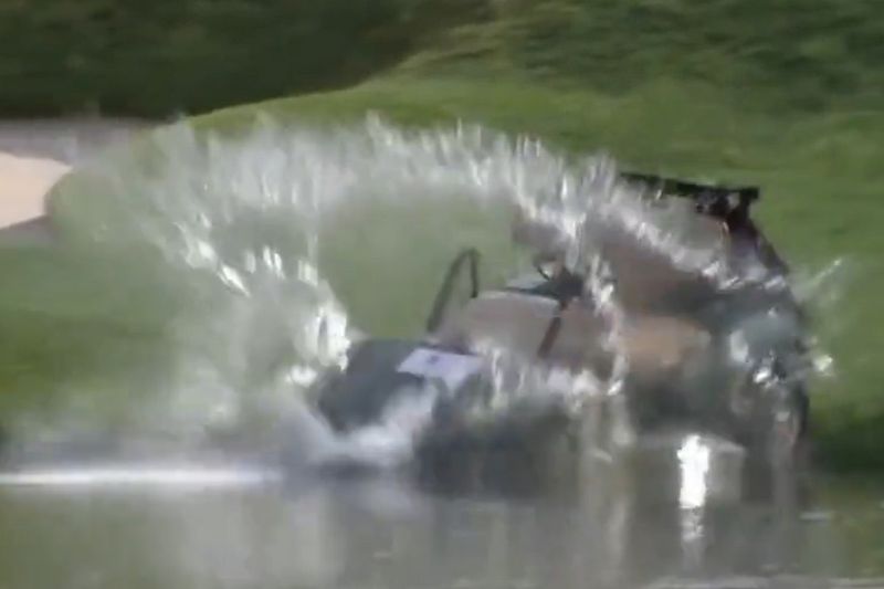 A runaway golf cart crashed into a pond during the first round of the Travelers Championship in the US.