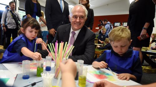Families ‘paying an extra $7k’ for childcare under the Coalition