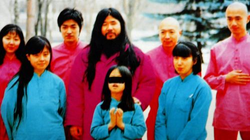 Cult leader Shoko Asahara with family members and his inner circle. (AP).