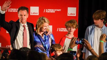 Chris Minns celebrates his election win with his family.