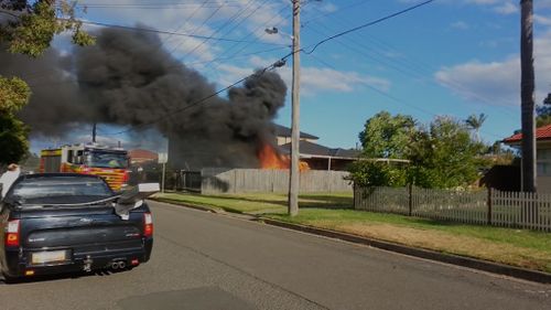 Locals reportedly saw smoke and flaming shooting out into the air before warning the occupants. (9NEWS)