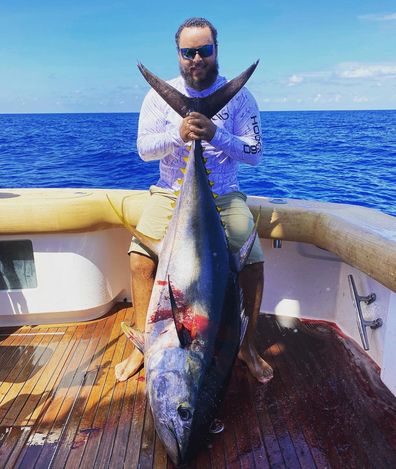 Connor Cruise, 26, shared a rare photo of him on a fishing trip.