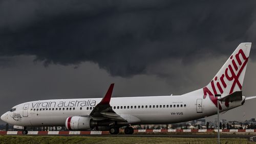 A Virgin Aircraft at Sydney's Kingsford Smith Airport. The company is launching a vaccination contest.