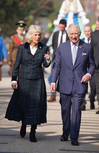 The Prince of Wales and the Duchess of Cornwall during a tour of CS Lewis Square, Connswater Greenway, Belfast, to visit the stalls along the Narnia-themed sculpture walk, which showcase East Side Partnership's community activities, on the second day of their two-day visit to Northern Ireland. Wednesday March 23, 2022 