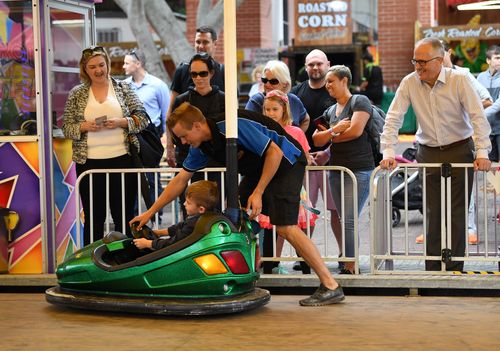 Malcolm Turnbull visited the Easter Show today. Pictured here watching his grandson Jack enjoying the dodgem cars. (AAP)