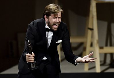 Swedish film director and screen writer Ruben Ostlund celebrates win at 30th European Film Awards in Berlin, Germany in 2017