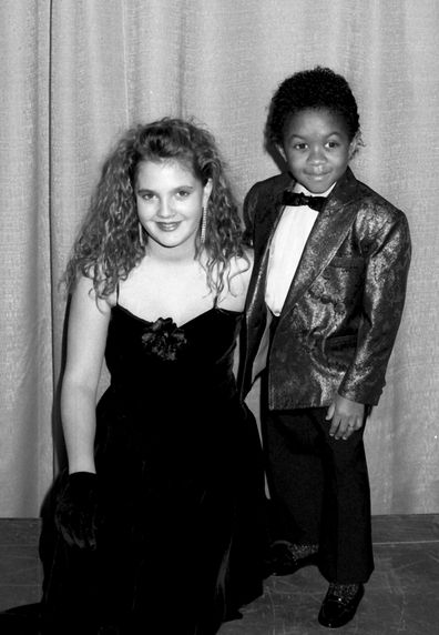 Drew Barrymore with fellow child star Emmanuel Lewis at the People's Choice Awards in 1987 1987.