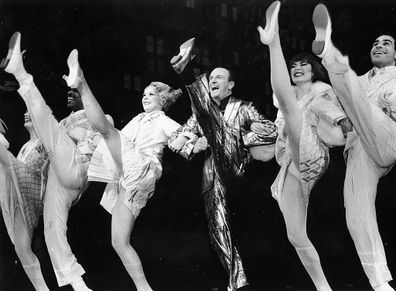 Peter Allen (center) is in step with the cast on opening night of the musical "Legs Diamond."