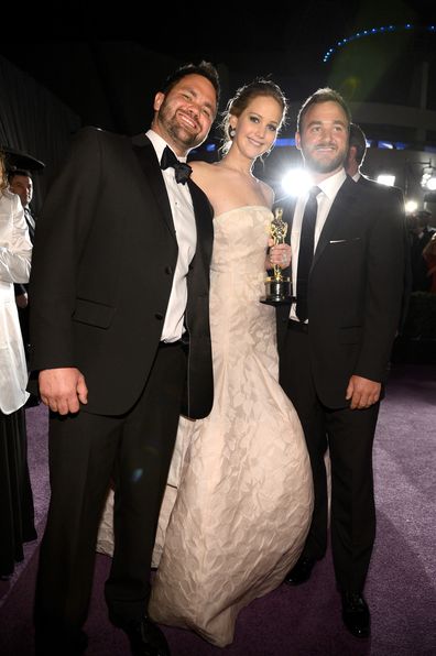 Jennifer Lawrence, winner of Best Actress for her role in 'Silver Linings Playbook' and brothers Ben Lawrence and Blaine Lawrence attend the Oscars Governors Ball at Hollywood & Highland Center on February 24, 2013 in Hollywood, California.