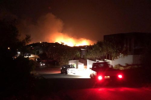 Residents evacuating bushfires in Peregian Springs, Queensland. (AAP Image/Supplied by Dan Bedford) 