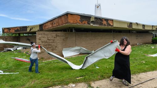 A tornado smashed into the Missouri capital as people slept on Wednesday night, ripping buildings apart.