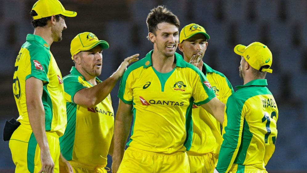 Mitchell Marsh is congratulated after taking a wicket as the Aussies reduced the West Indies to 6/145 from their 20 overs.