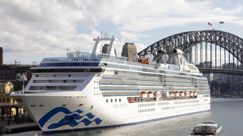 The Coral Princess docks at Circular Quay on July 13, 2022 in Sydney, Australia. The Coral Princess, currently experiencing a COVID-19 outbreak on board, arrived in Sydney on Wednesday morning. (Photo by Jenny Evans/Getty Images)