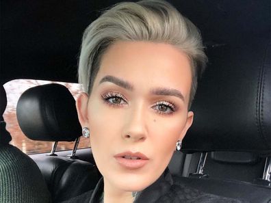 Beauty YouTuber Mel Thompson sitting in a car looking into the camera, taking a selfie.