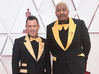 9.20am Travon Free's yellow suit hides special message

Travon Free had something to say on the Oscars red carpet about police brutality.
The writer and performer wore a Dolce & Gabbana yellow suit which featured the names of people killed by police violence.

