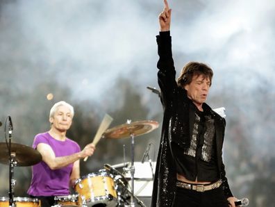 Mick Jagger, right, and drummer Charlie Watts, perform with the Rolling Stones at halftime of the Super Bowl XL football game in Detroit on Feb. 5, 2006. 