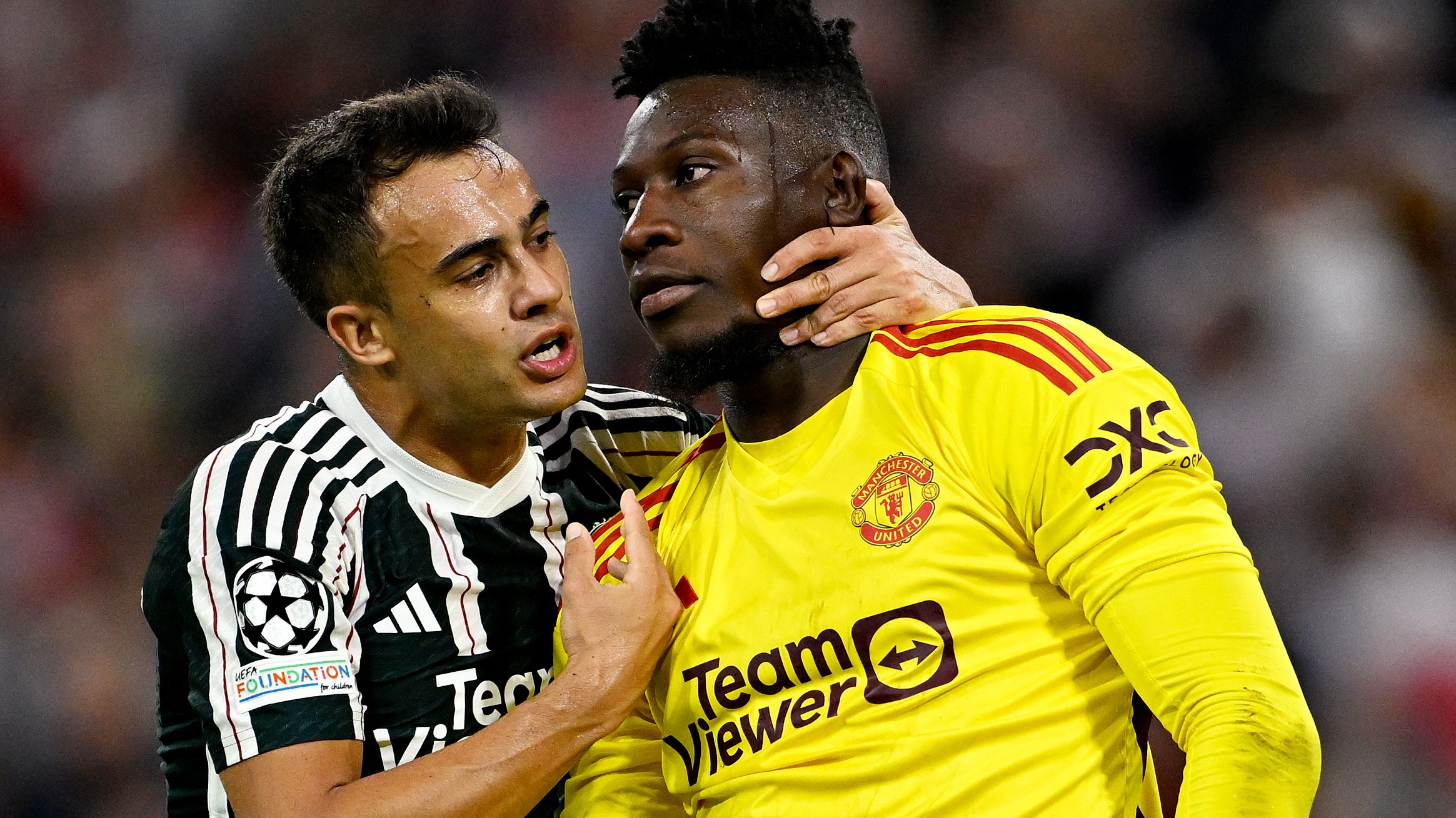 MUNICH, GERMANY - SEPTEMBER 20: Sergio Reguilon and Andre Onana of Manchester United interact during the UEFA Champions League match between FC Bayern München and Manchester United at Allianz Arena on September 20, 2023 in Munich, Germany. (Photo by Daniel Kopatsch - UEFA/UEFA via Getty Images)