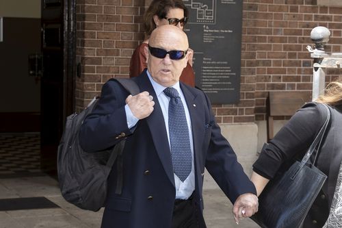 Angry Anderson and family leave the King Street Courts today.